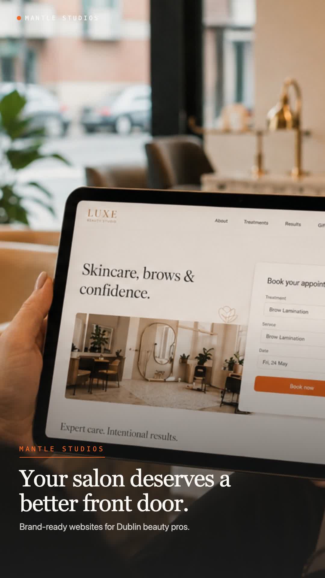 Salon website and booking experience shown on a laptop in a beauty studio.